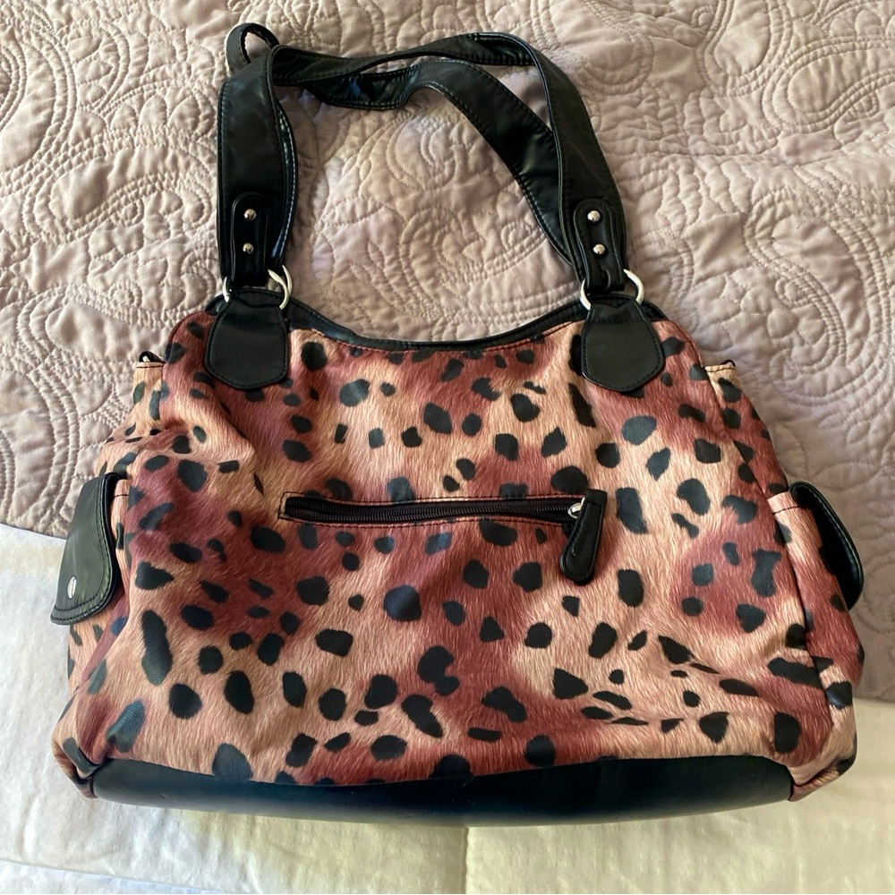 Cute animal print purse by Angel Barcelo